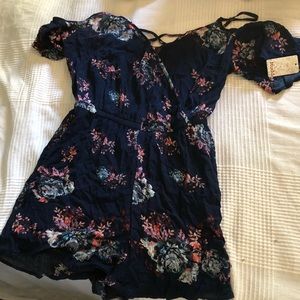 dark blue romper with floral pattern